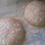 Two piece of dough on a plate